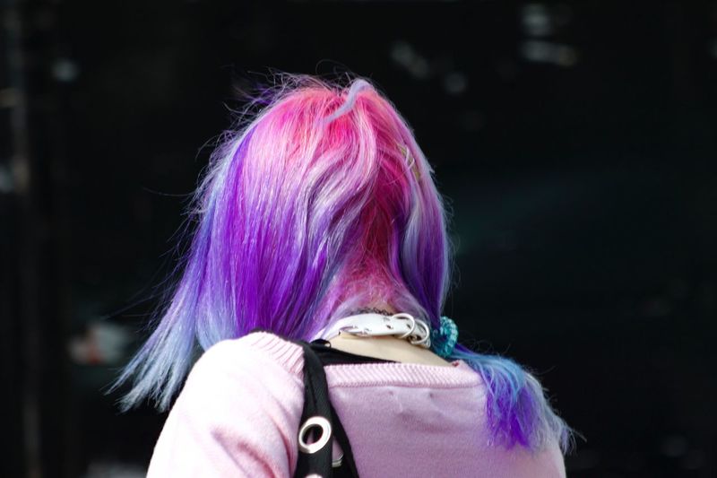 Rear view of woman wearing wig
