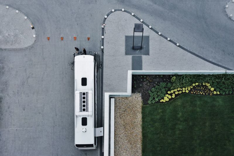 HIGH ANGLE VIEW OF BUILDING AND WALL
