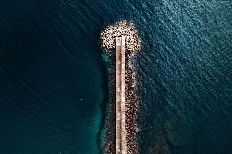 Directly above shot of pier in sea