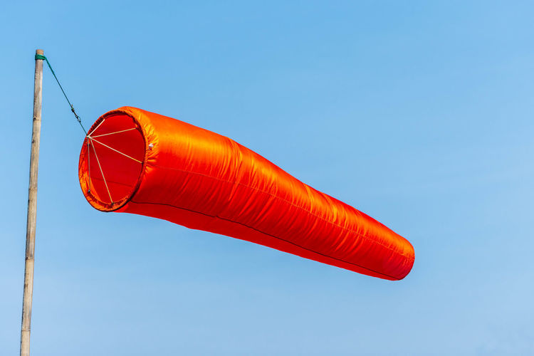 Windsock indicator of wind on runway airport. wind cone indicating wind direction and force. 
