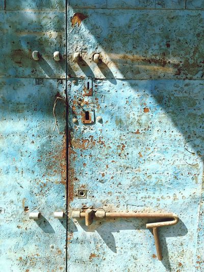 Close-up of rusty metallic door