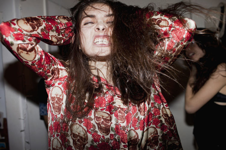 Young woman dancing at a party