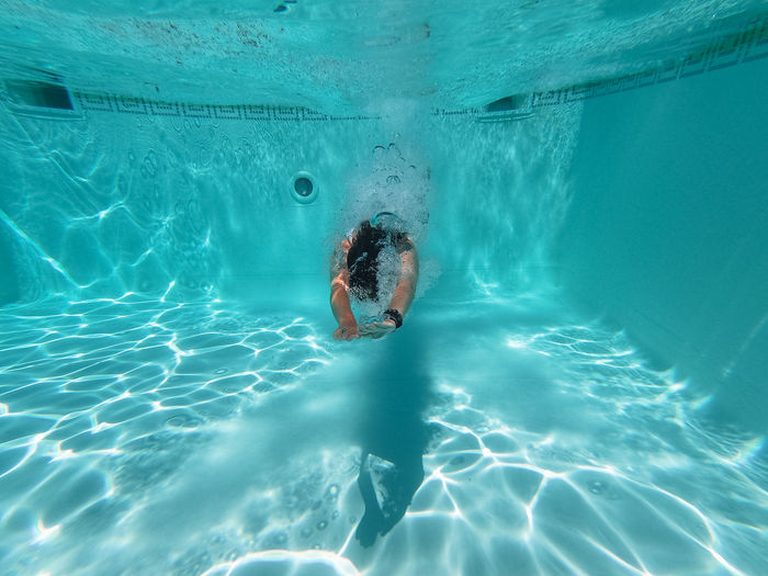 Woman swimming in pool