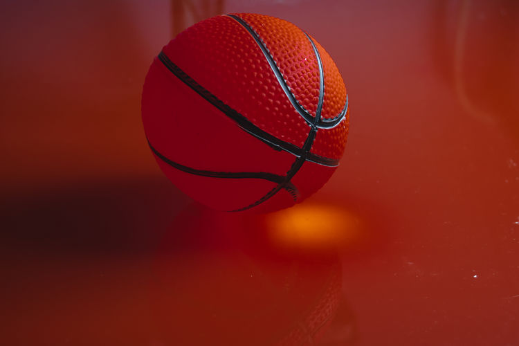 Close-up of red ball on table