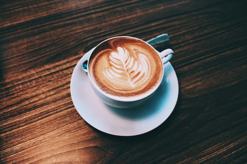 High angle view of cappuccino on table