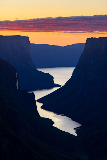 Scenic view of sea against sky during sunset in gros morne national park, newfoundland, canada