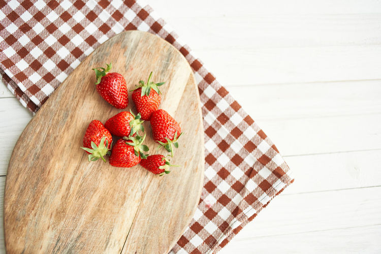 High angle view of strawberry on table