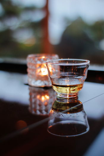 Close-up of whiskey on table
