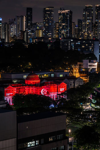 Illuminated city lit up at night
