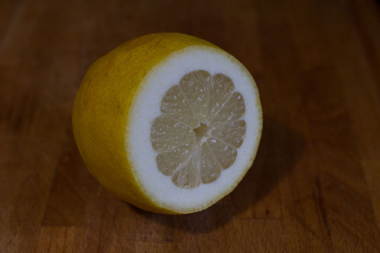 Close-up of lemon on table