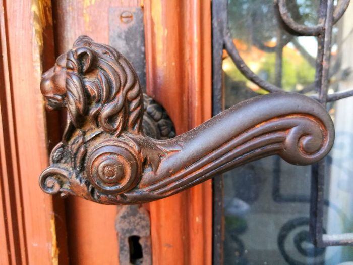 Close-up of closed door knocker