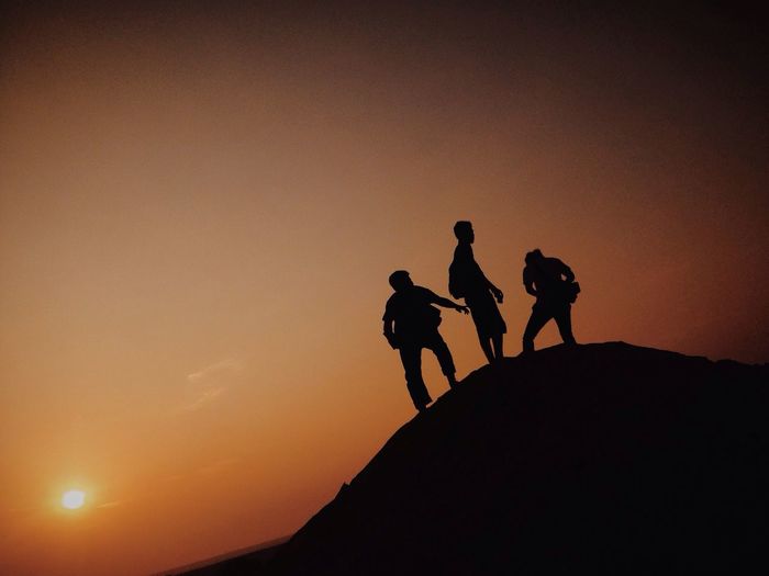 Silhouette of man at sunset