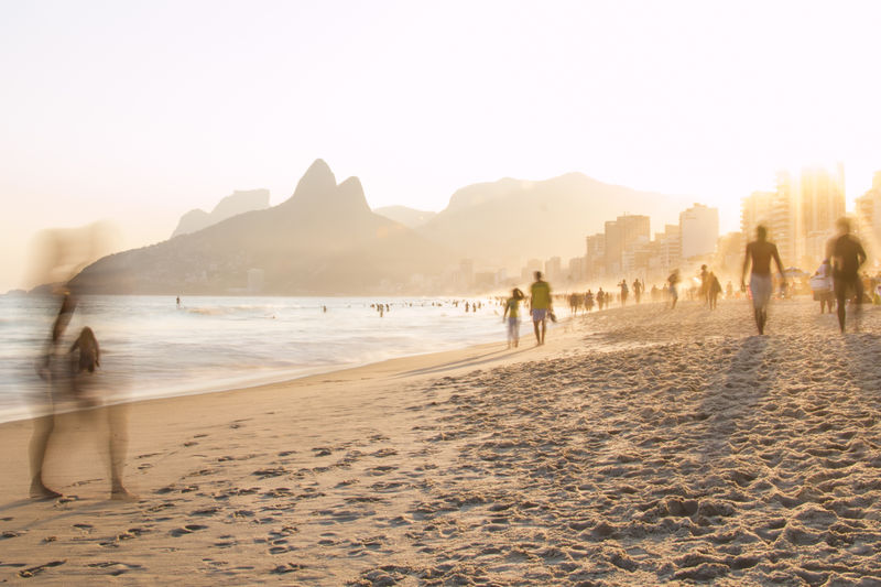 People walking on beach