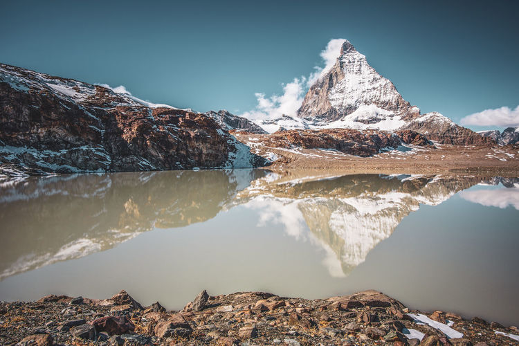 Matterhorn reflection in the theodul glacier lake, switzerland.