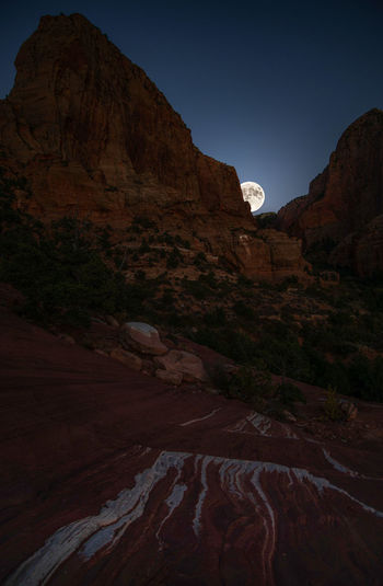 Full desert moon rise in zion national park