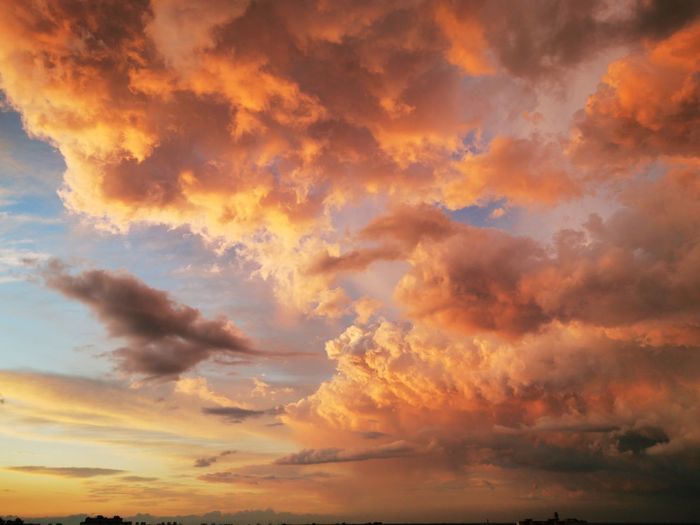 Low angle view of dramatic sky during sunset