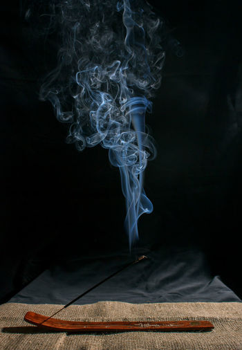 Close-up of smoke against black background