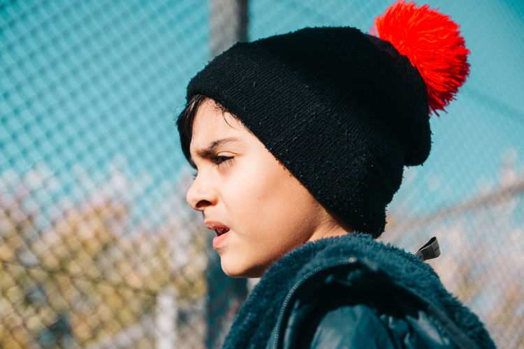 Portrait of little boy wearing warm clothing