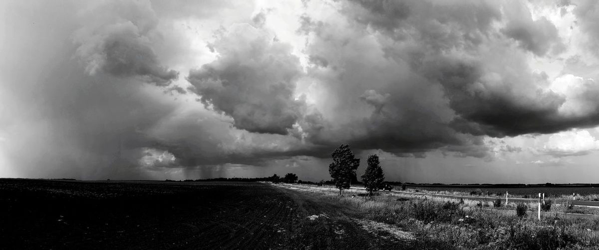 Panoramic view of storm clouds over land