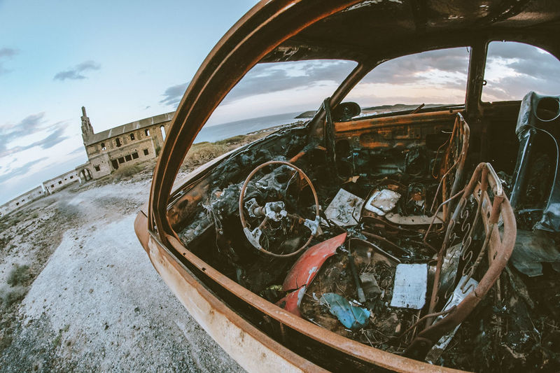 Fish-eye view of abandoned car