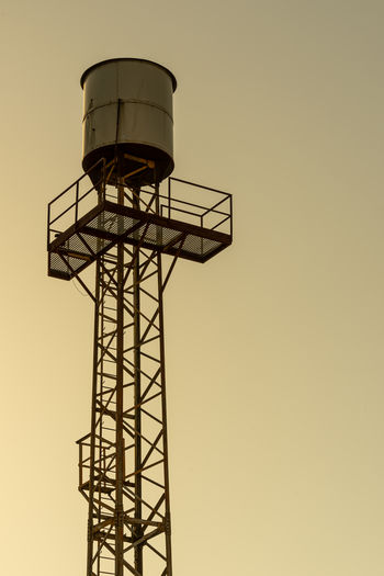 Low angle view of lighthouse against clear sky