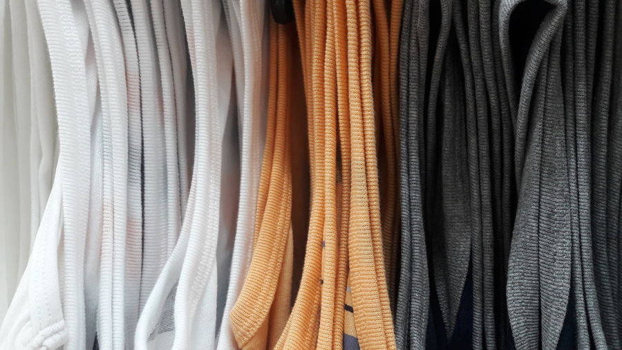 Full frame shot of clothes hanging in store