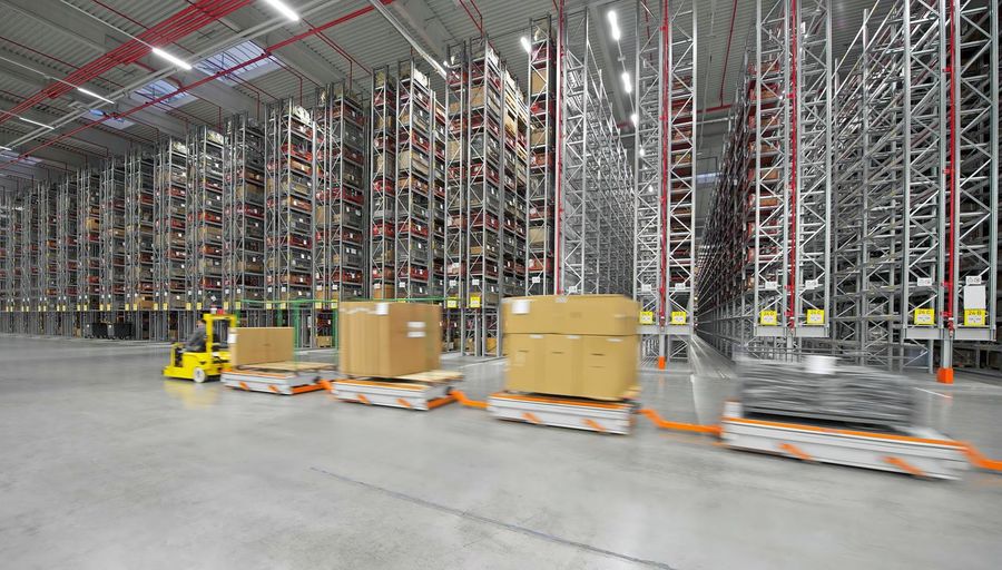 Automated warehouse. boxes with spare parts moving on conveyer,moving part in warehouse