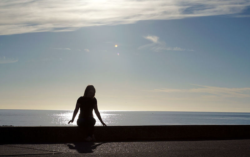 Silhouette of people on beach