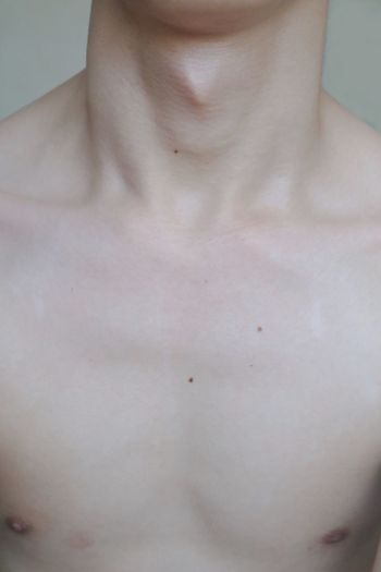 Close-up of shirtless woman