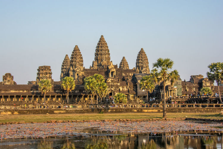 View of temple against buildings