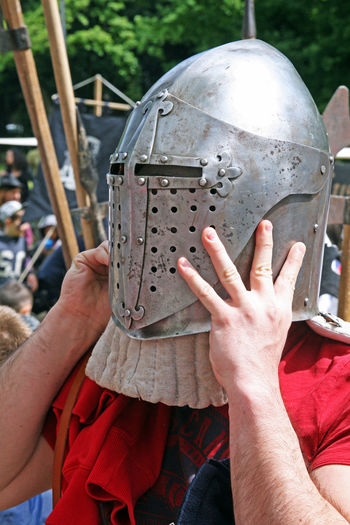 Man wearing knight helmet
