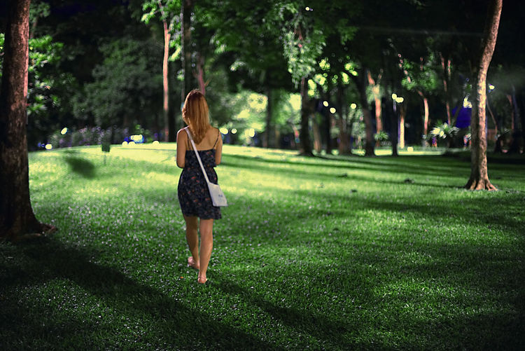 Full length of woman walking in park