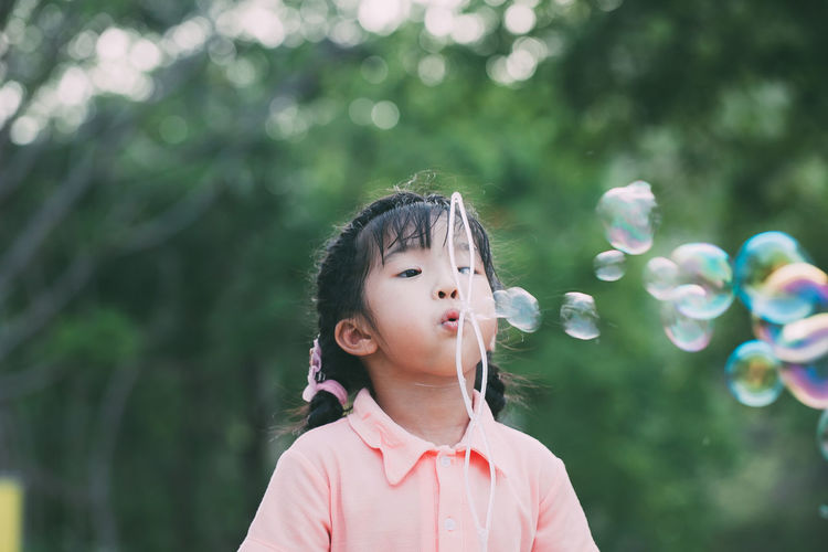 Portrait of a girl with bubbles