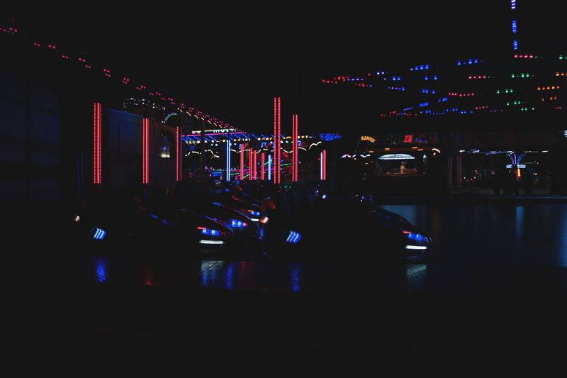 Illuminated building in city at night