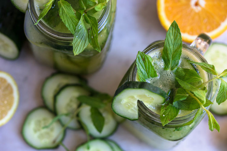 Close-up of drink with mint and cucumber