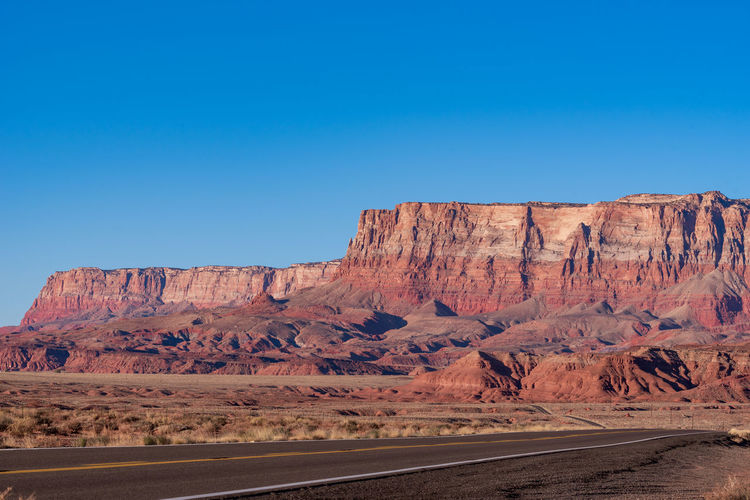Landscape of road and multi-colored vermillion cliffs national monument in arizona