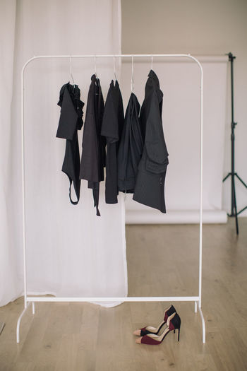 Clothes hanging on table at home