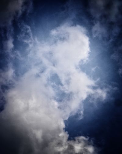 Low angle view of clouds in blue sky