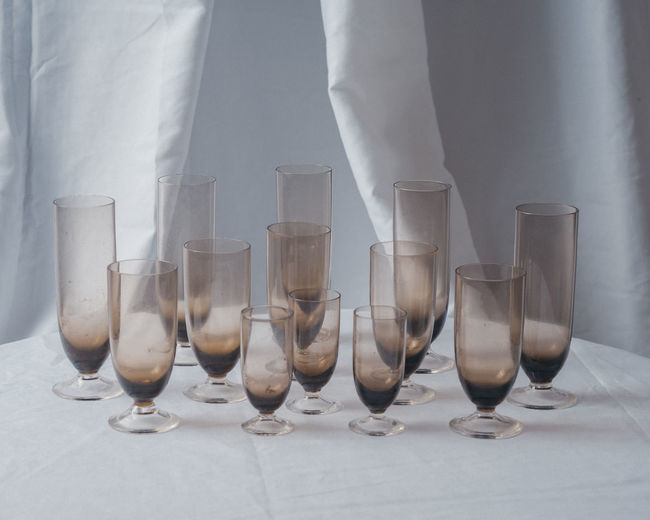 Close-up of glasses on table