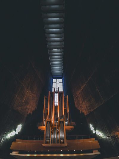 Low angle view of illuminated staircase in building