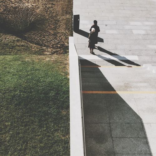 Shadow of woman on wall