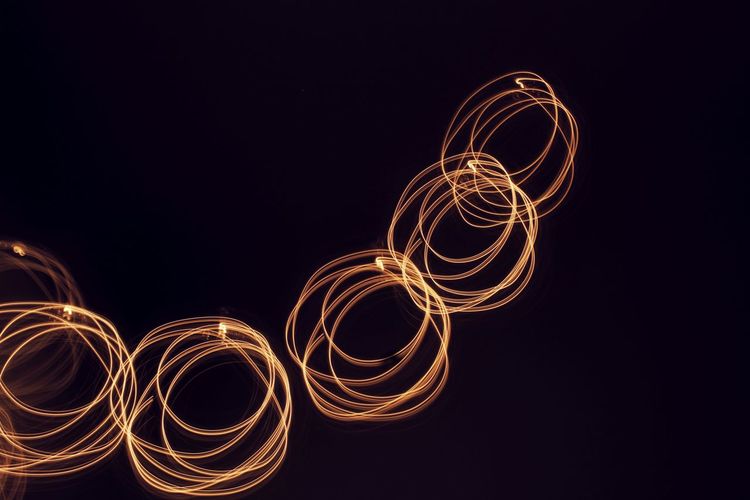 Light painting against black background