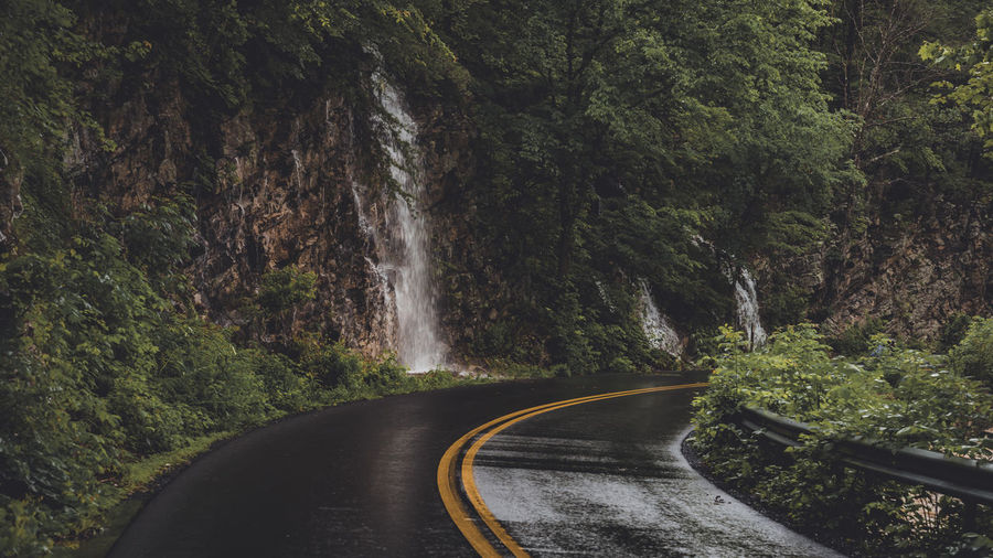 Waterfalls on mountain by road