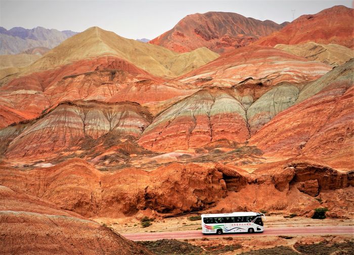 A road through the colorful mountain in zhangye national geopark