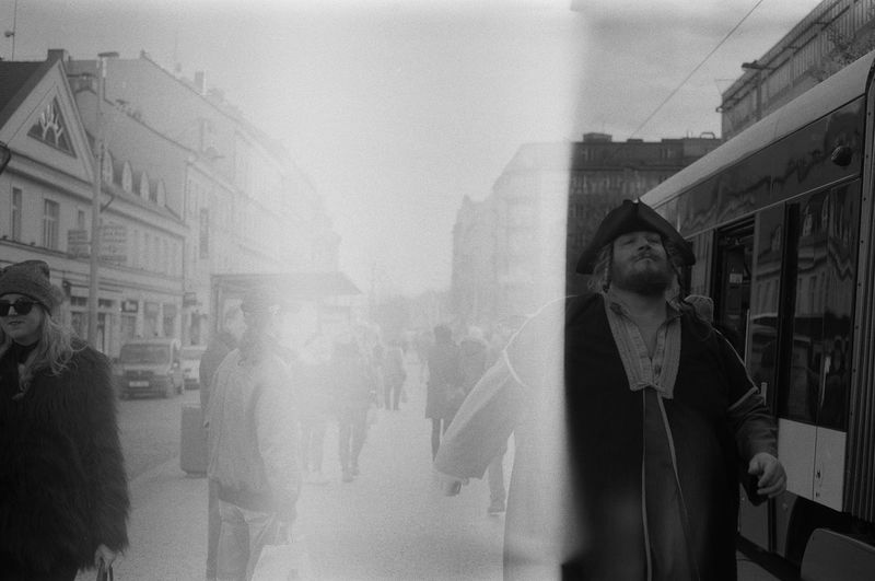 Rear view of woman walking on street
