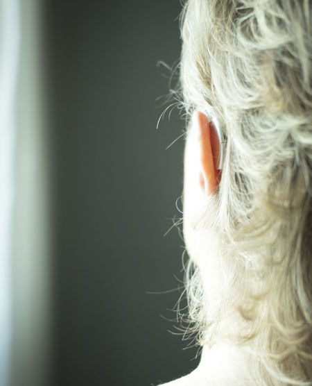 Close-up of woman wearing hearing aid