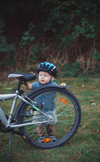 Boy riding bicycle