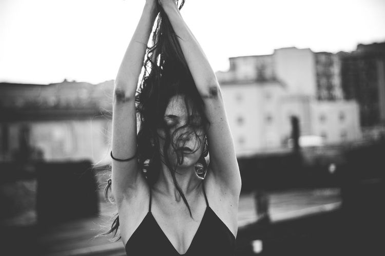 Close-up of woman stretching