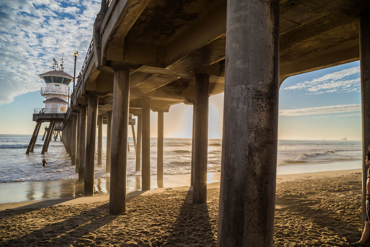 Below view of huntington beach pier in sea