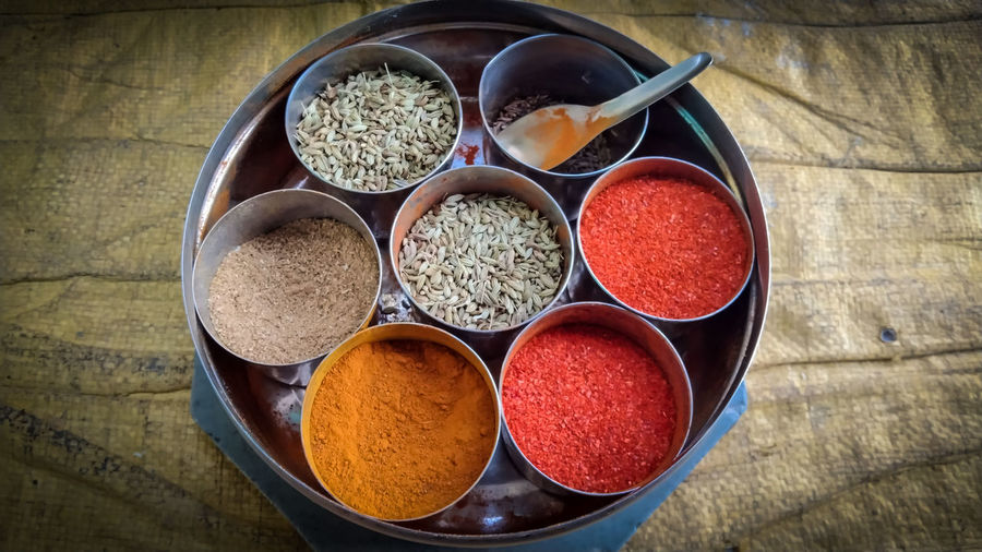 High angle view of spices in container on table